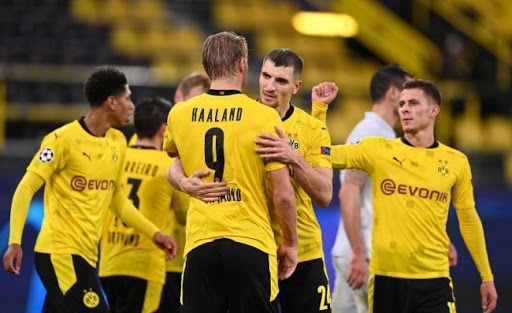 Borussia Dortmund prøver å gå videre til topp fire i Bundesliga i de fire siste rundene